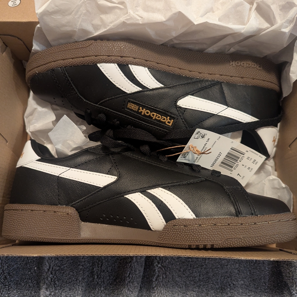 Reebok Unisex Black and White Sneakers